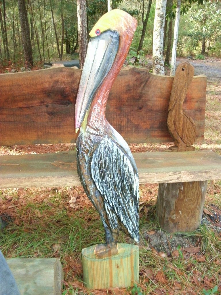 Pelican on the Pier 4ft. chainsaw carved saltwater by oceanarts10