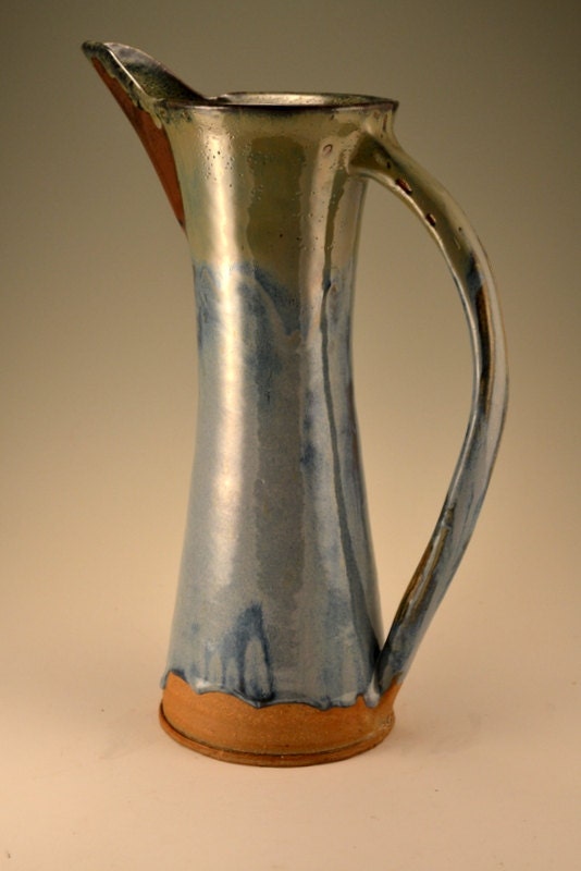 Stunning tall 19 inch stoneware pitcher with a steel blue