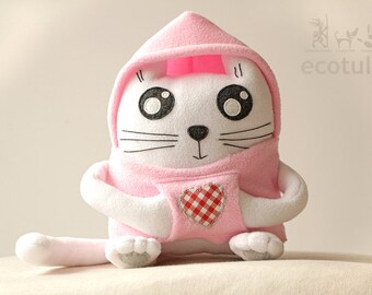 white soft toy cat