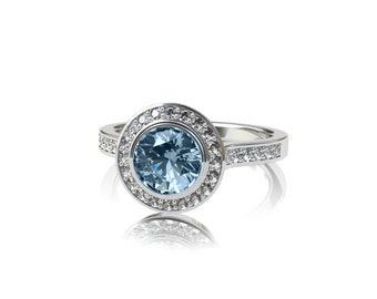 Blue topaz diamond engagement rings