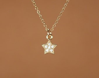 Tiny star necklace | Etsy