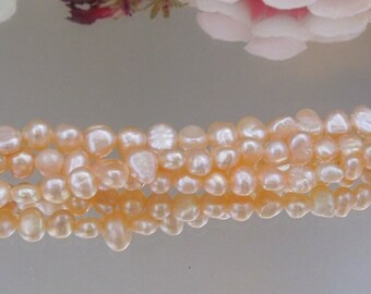 Bastet's Beads- Destash- 7.5" strand Peachy Pink Potato Pearl- 4x5mm