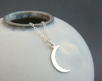 small crescent moon necklace. sterling silver moon sliver charm. tiny celestial astrology delicate dainty pendant. simple everyday jewelry