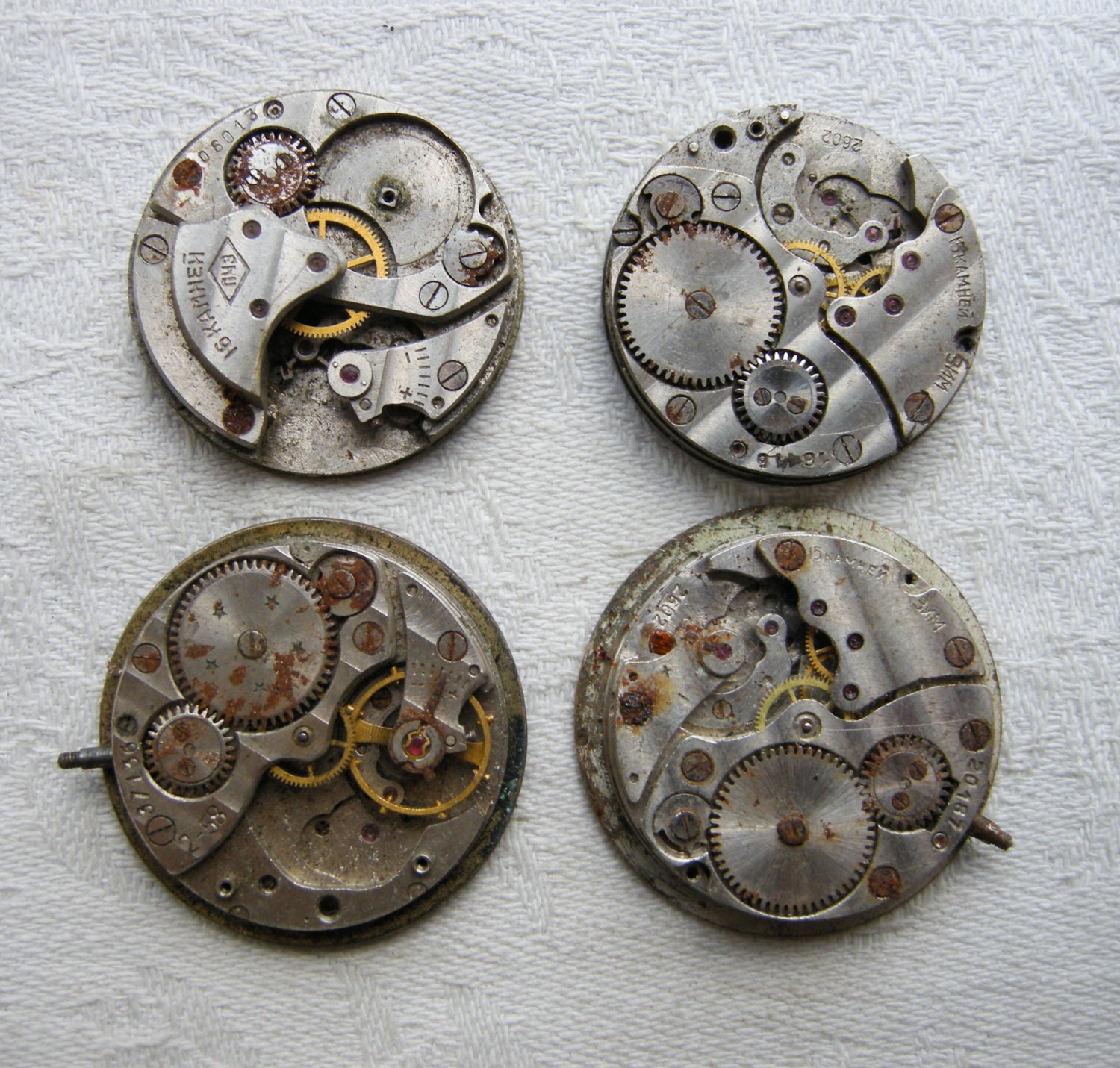 0.9 inch Set of 4 vintage watch movements.