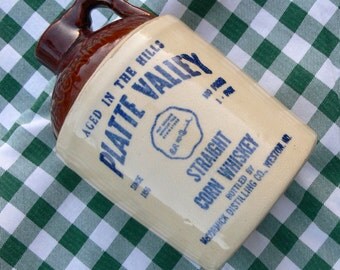 MC cormick little straight corn whiskey jug