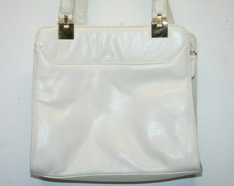 white shoulder strap purse