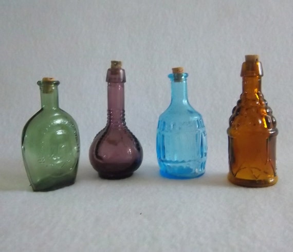 Four Miniature Vintage Bottles