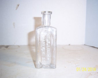 1890's Mrs MJ Bradford Claremont NH 4 7/8 inch Clear food bottle