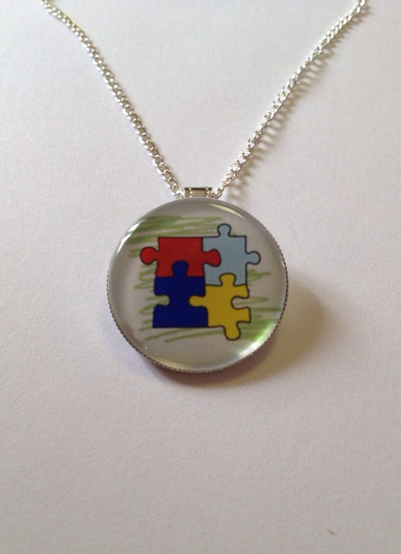 Items similar to Autism Puzzle Pieces 1" Pendant Silver Plated Necklace
