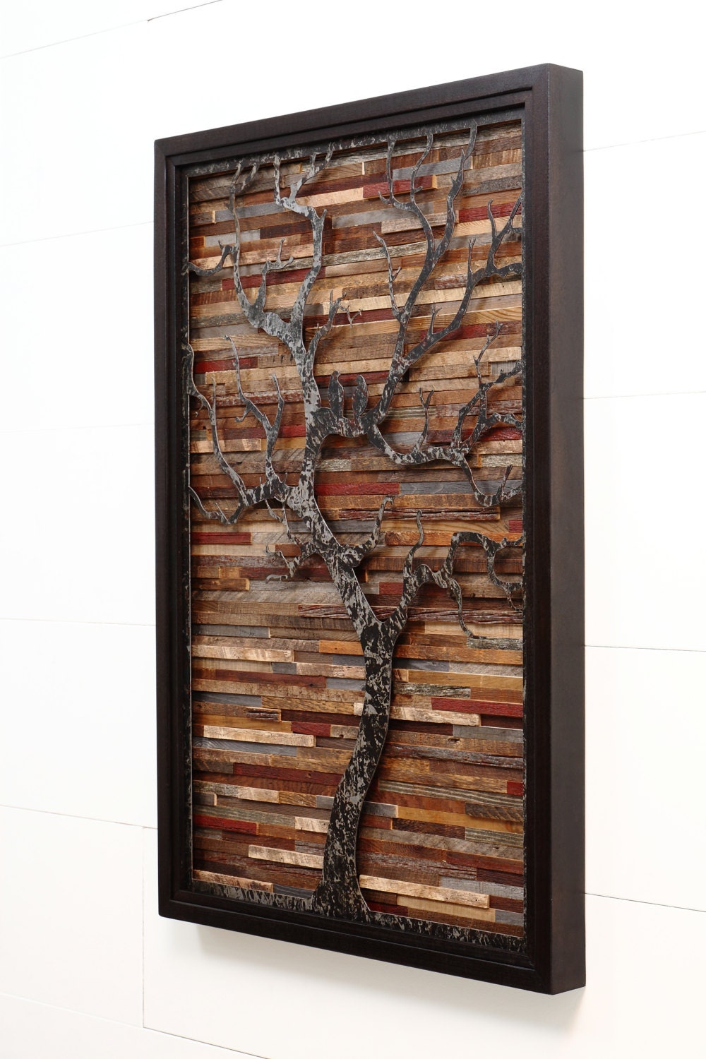 Wood wall art made of old barnwood and natural steel