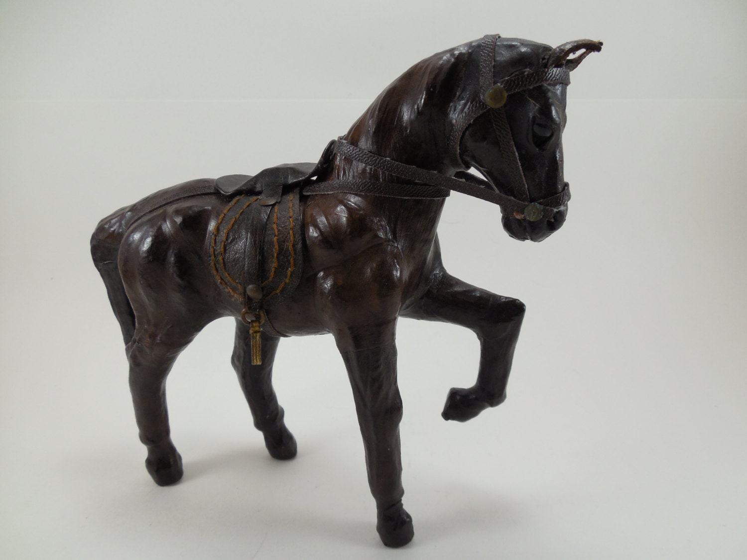 leather covered horse figurine