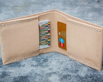 Minimalist handstitched leather wallet.