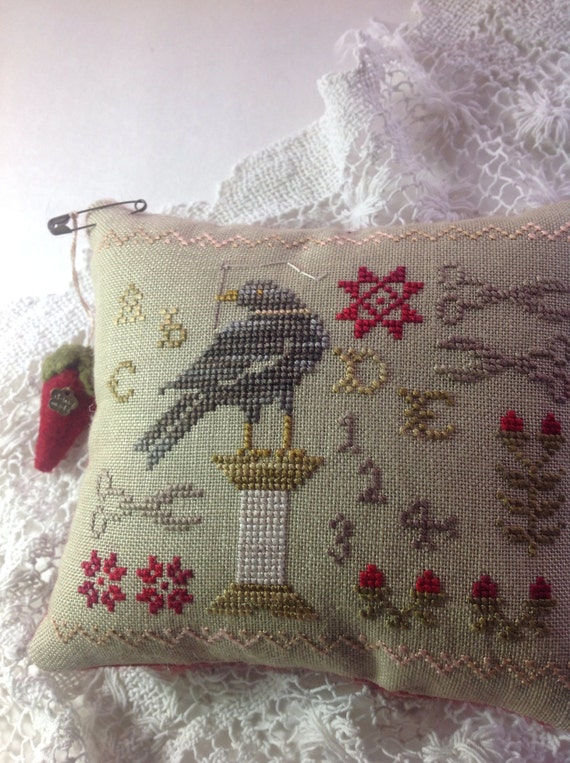 Hand stitched primitive pincushion bowl filler with blackbird