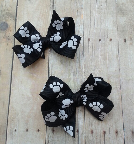 Paw print bows by ArabellasBows on Etsy