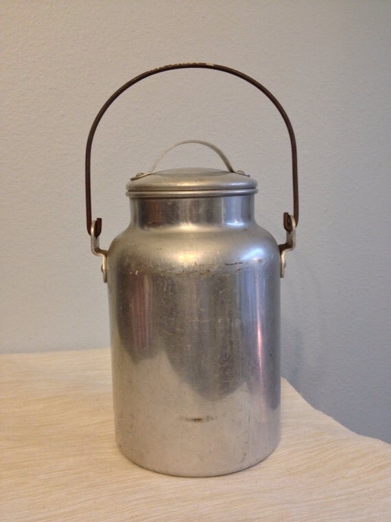 Vintage rustic aluminum milk jug cream can farm decor Vintage rustic aluminum milk jug cream can farm decor