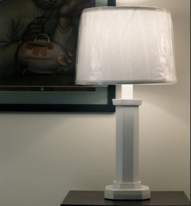 Classic table lamp of sustainable wood without shade. Includes
