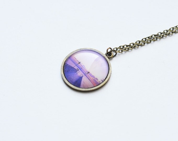 NATURE Round pendant metal brass with a picture of a purple sunset/sunrise under glass
