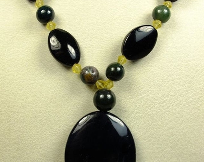 Storewide 25% Off SALE Designer Zumani Smoked Glass tribal pendant with full length necklace of black, green, and yellow beads