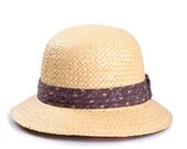 Straw cloche hat , Sun hat , Woman's Short brimmed hat , decorated with a ribbon.