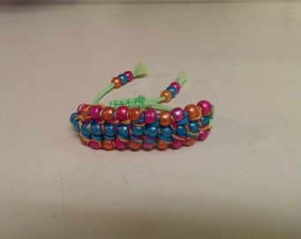 3 row beaded bracelet with sliding closure.
