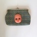 Vintage purse with doll head