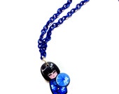 Cute colorful kokeshi doll // Japanese doll // Acrylic laser cut pendant charm necklace. Available in blue, green, red, purple yellow colors