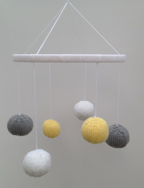 Items similar to Yellow, Gray, and White handknit baby crib mobile on Etsy