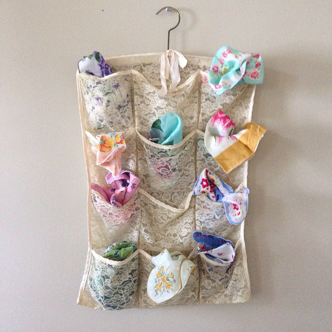 Vintage lace pocket storage hanger