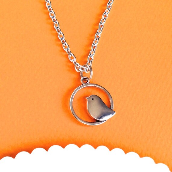Items similar to SILVER BIRDIE NECKLACE - on Etsy