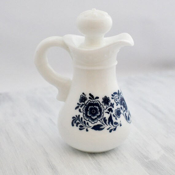 Avon bath oil caraffe White Milk Glass Blue flowers
