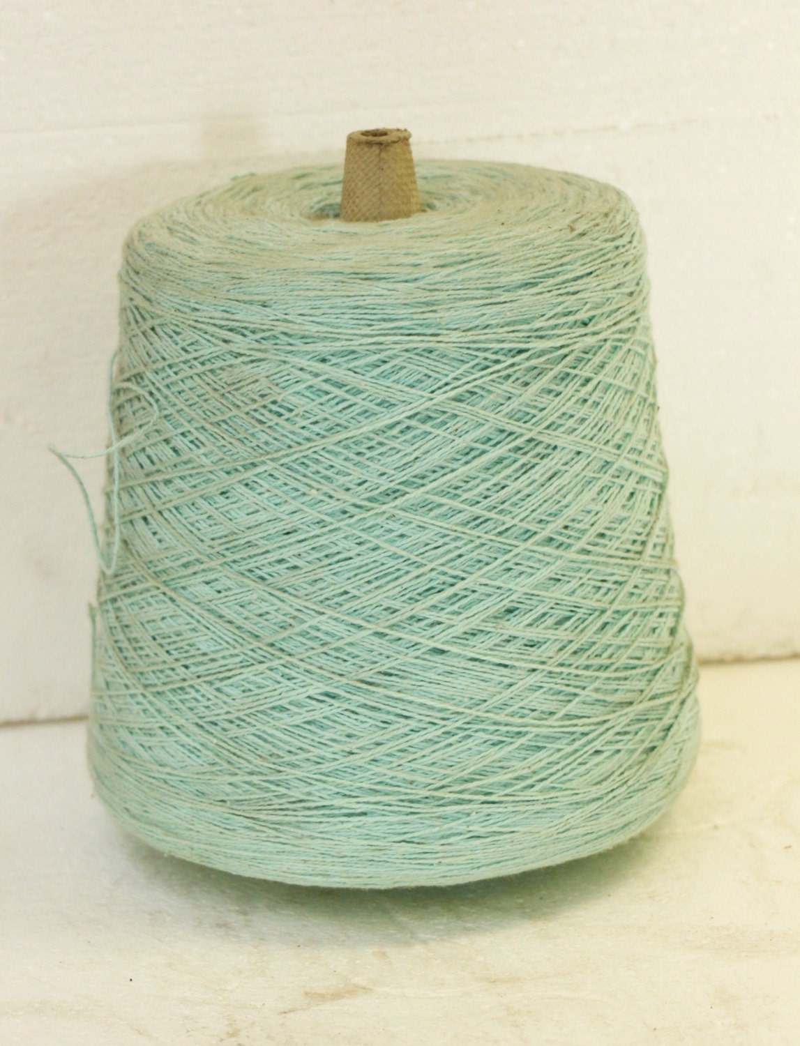 Extra large spool of powder blue acetate thin yarn