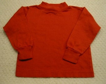 Vintage orange long sleeved Buster Brown tee shirt . . . size 2 . . . from the 1960's . . .excellent condition . . . Made in the USA