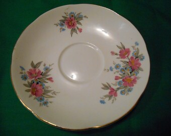 One (1), 5 3/4", Bone China, Tea Cup Saucer, from Adderley, in a Floral Pattern.