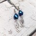 RTS 25% OFF: Dangle Earrings, Deep Sapphire Blue Swarovski Teardrop Crystals, Ornate Tibetan Silver Ichthus Charms