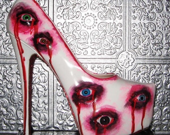 white patent platform heels with eyeballs, paint and glitter