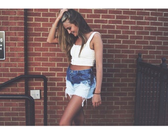 High waisted medium blue bleached ombré denim shorts that tasia Alexis wore