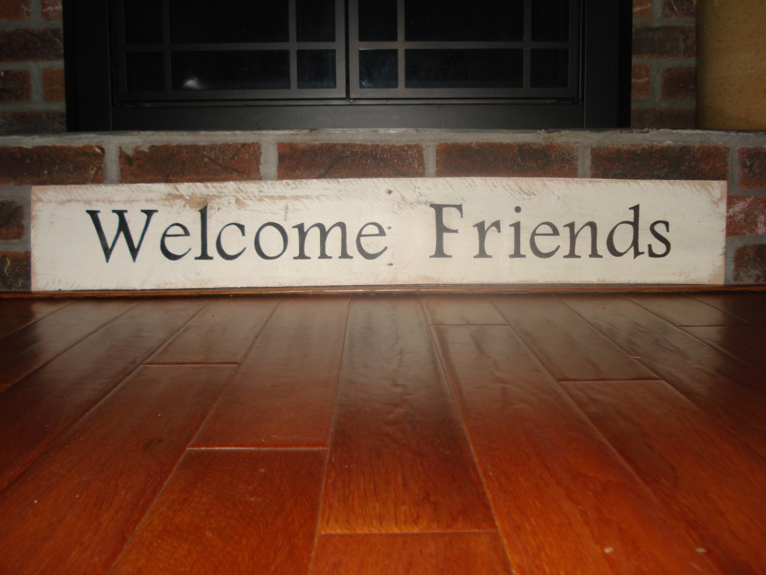 Friends sign hand painted on a piece of by Twoheartssigns