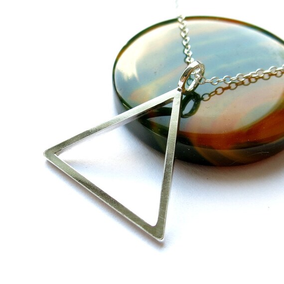 Necklace fire symbol