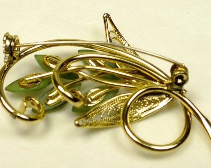 Storewide 25% Off SALE Beautiful vintage 2" goldtone and jade brooch featuring a swirling stem and openwork leaf design with marquis jade st