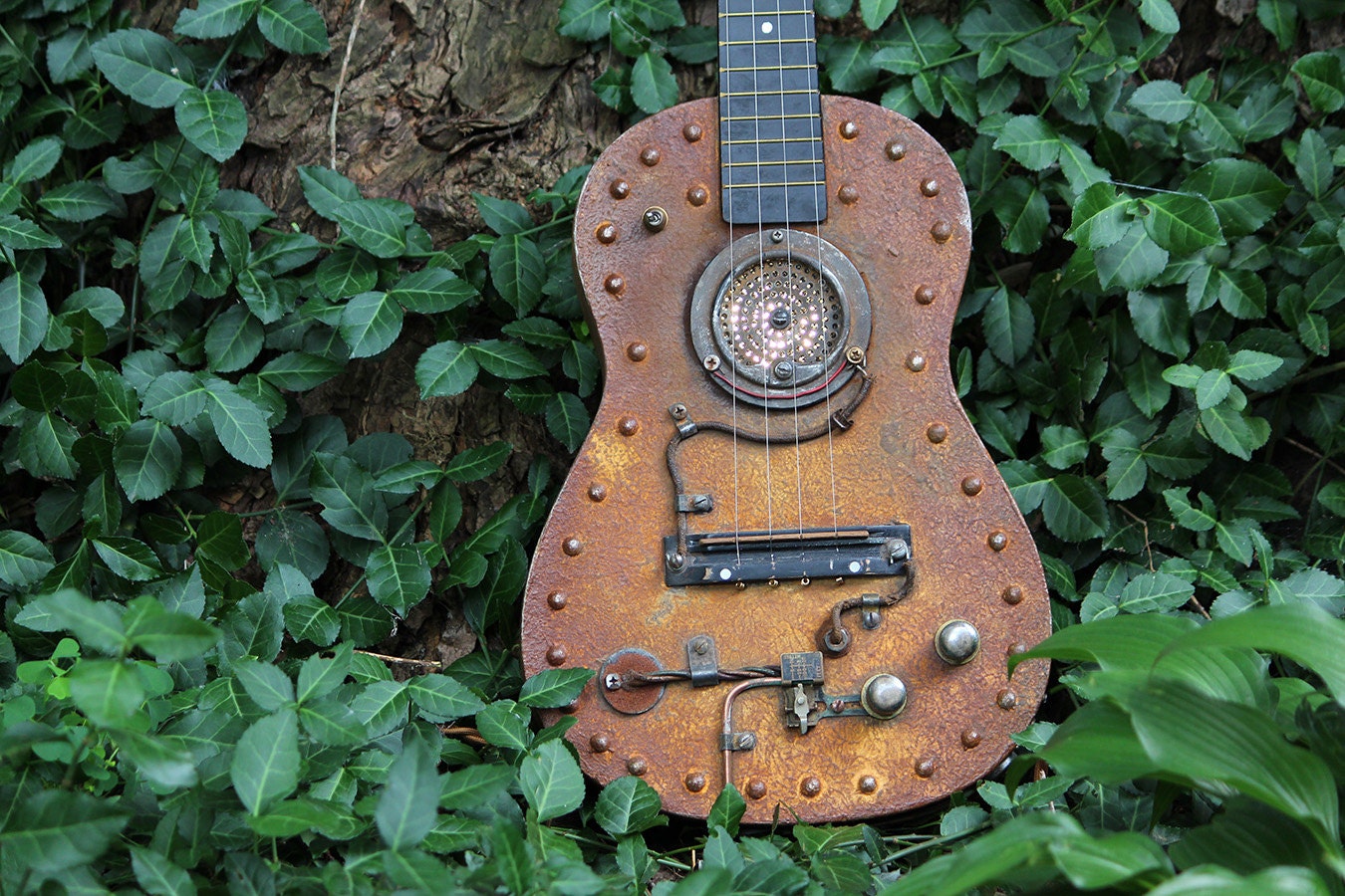Steampunk Iron Ukulele musical instrument with custom paint