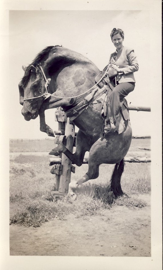 Woman Riding a BUCKING BRONCO HORSE In Fun Photo 1943 Near