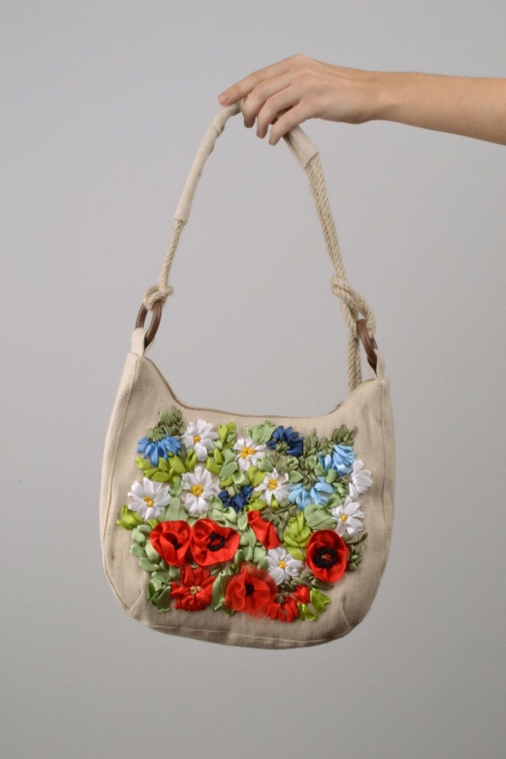 Fabric bag embroidered with ribbons