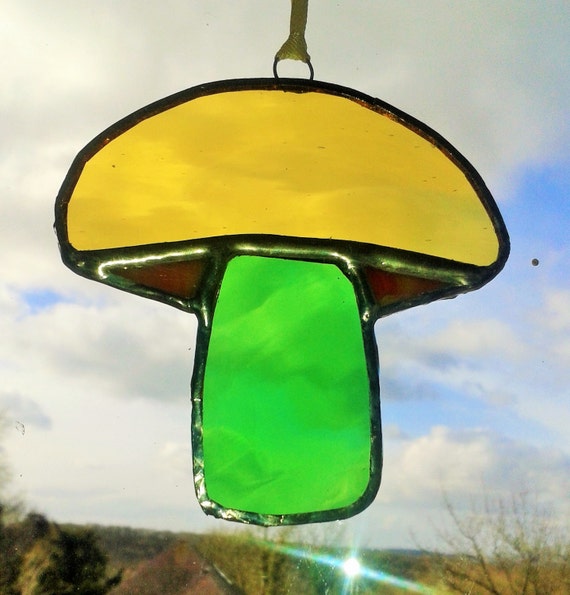 Hand made stained glass mushroom suncatcher by ClareasGlass