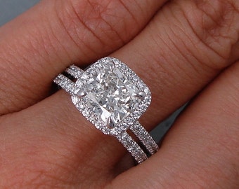 Sparkling 2.15 ctw Cushion cut diamond ring and wedding band set with a gorgeous 1.61 ct H/SI1 Clarity Enhanced Cushion cut diamond