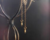 The Pit and the Pendulum - minimalist geometric earrings in golden brass.