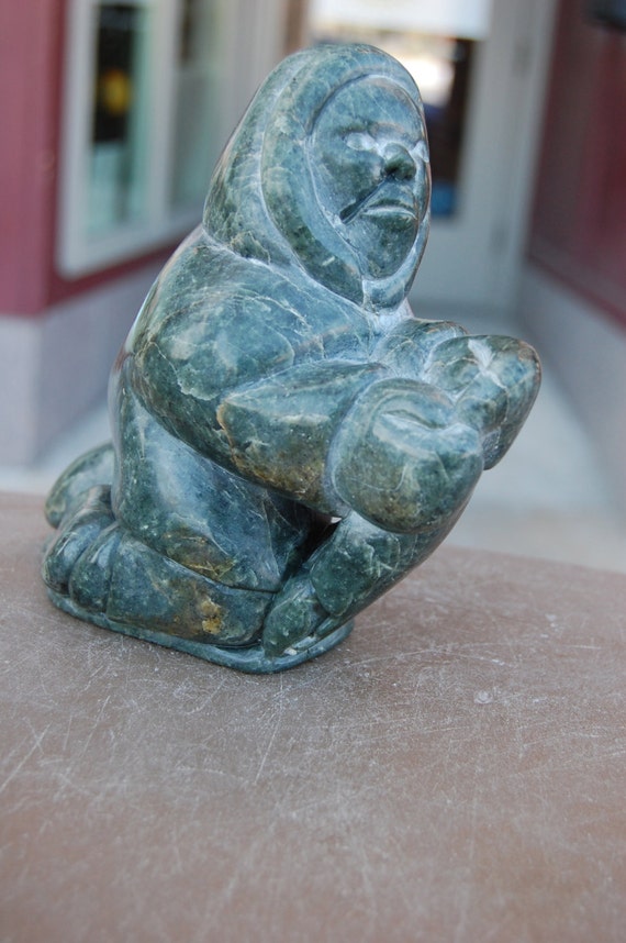 Vintage Inuit soapstone carving Man with Beaver. by hazelhome
