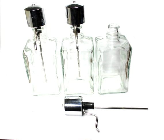 Vintage Liquor Decanter set. pump dispensers. set of three. no etching