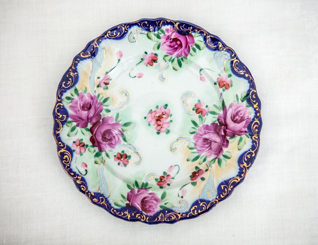 Antique Handpainted Porcelain Floral Plate with Flo Blue edge