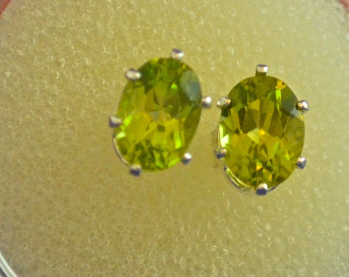 Peridot stud Earrings, 7x5mm Oval, Natural, Set in Sterling Silver E685