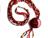 Agate & Glass Brightly Beaded Ethnic Necklace with Polished Red Pendant and Multi Colour Tassels
